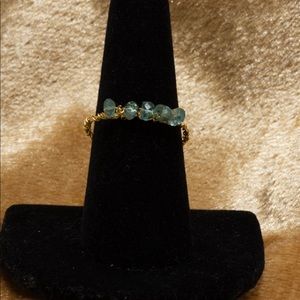 Multiple apatite stones wrapped with 18k gold filled wire. Size 9 ring.